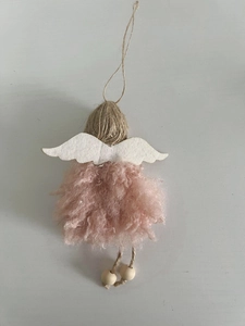 Detail of pink plush angel ornament with felt wings and natural hemp rope for Christmas tree