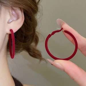Elegant wine red flocked round hoop earrings for women with velvet texture and silver needles