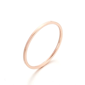 Three-in-one minimalist rose gold stainless steel ring set for women on white background