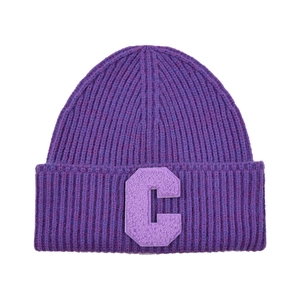 Close-up of purple ribbed knit beanie with a textured light purple letter C patch