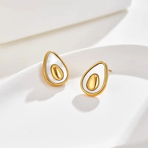 Detailed view of avocado-shaped stud earrings with gold finish and shell inlay