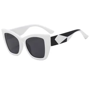Retro cat-eye butterfly sunglasses in white frame with black geometric temple accents