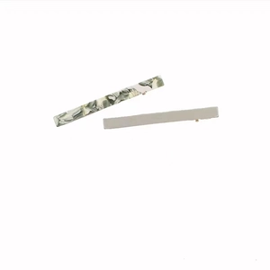 Set of two marble green and beige acetate hair clips with sleek metal base for women