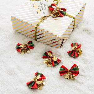 5cm red and green plaid Christmas bows with golden bells on festive snow background