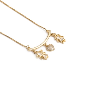 Golden heart necklace with boy and girl pendants and micro-set zircon stones