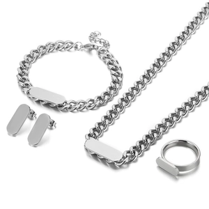 Polished stainless steel jewelry set featuring Cuban link necklace, bracelet and bar charms