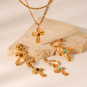 Golden double-layer necklace with cross pendant and matching gemstone drop earrings