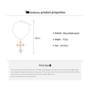 Detailed view of pearl cross pendant necklace with size 38+10cm and weight 32.2g
