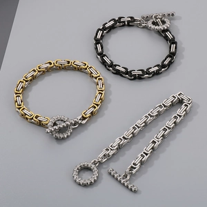 Stainless steel Byzantine king chain bracelet with skull OT buckle in three metallic tones