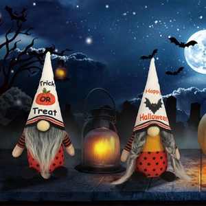Detail of two Halloween gnomes with Trick or Treat and Happy Halloween text on hats