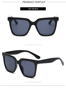 Close-up of classic glossy black square frame sunglasses with dark grey lenses