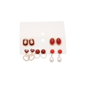 5-pair set of vintage red heart and pearl earrings with gold accents on display card