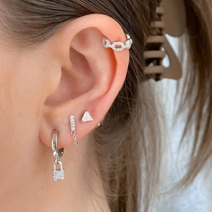 925 sterling silver earring set with tassel chain, lock pendant, and zircon studs on ear