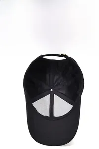 Detailed top view of a black baseball cap with breathable mesh and structural white lining