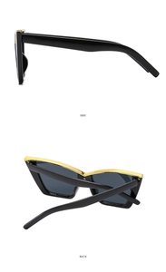 Detailed side and back views of black cat-eye sunglasses with gold metal trim accents