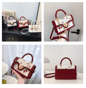 Detailed grid view of cherry print crossbody bags showing twist lock and color options