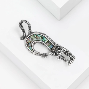 Retro cat brooch with iridescent abalone shell inlay on silver metal base