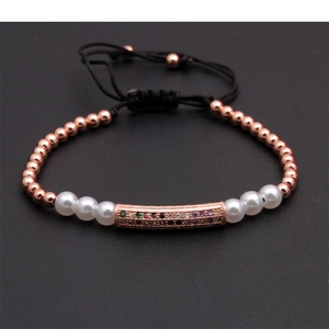 Adjustable black cord bracelet with rose gold beads and colorful zircon curved bar detail