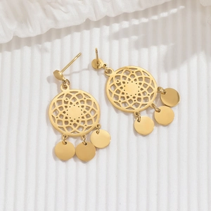 Golden dreamcatcher earrings with geometric mesh and swinging metallic disc pendants