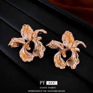 Vintage golden iris flower earrings in irregular metallic design for women with 925 silver pins