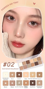 Macro detail of neutral cement grey eyeshadow palette showing 12 shades and textures
