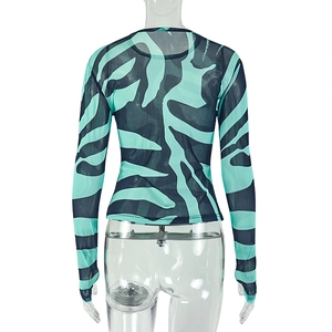 Detail of mint green zebra print mesh top showing back view on a mannequin