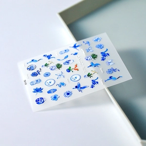 Detailed 5D nail art sticker featuring blue and white porcelain cranes and floral patterns
