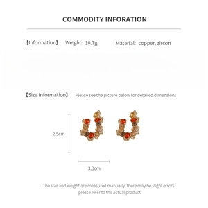 Detailed size information for vintage U-shaped earrings with zircon and copper specs