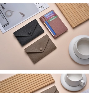 Close-up of litchi texture PU leather card holders in black, khaki, and pink colors