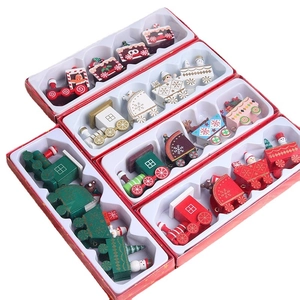 Set of five colorful wooden Christmas train ornaments with snowman and Santa figures