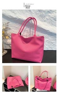 Detail of rose red woven tote bag showing fine texture and long double straps