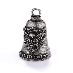 Detailed view of silver archangel bell pendant with engraved Ride Safely Love You text