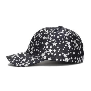 Classic black baseball cap with all-over silver star print and curved brim