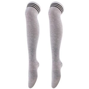 Detail of grey over-the-knee socks featuring classic black triple stripes on a white background