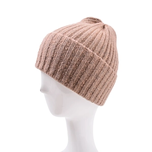 Detail of light brown ribbed knit beanie showing thick texture and folded cuff style