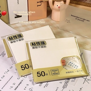 Detailed view of 76x76mm clear PET sticky notes on text for easy highlighting and writing