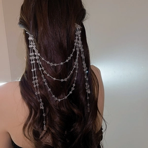 Detailed view of elegant multi-layered tassel beaded hair chain with crystal beads