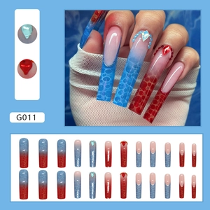 Long square press-on nails with blue-red gradient and 3D bubble texture and rhinestones