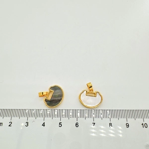 Detailed size comparison of 18K gold plated shell charms with a metric ruler