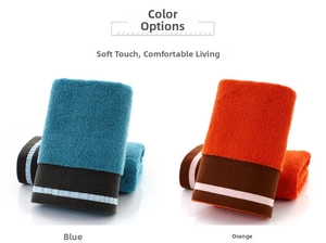 Close-up of blue and orange cotton towels with thick absorbent texture and striped hem
