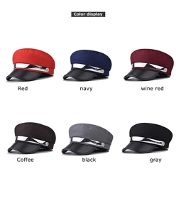 Standard grid display of six colored fiddler caps with leather brims and metal chains