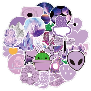 Close-up of assorted purple VSCO style vinyl stickers featuring joy and trendy motifs