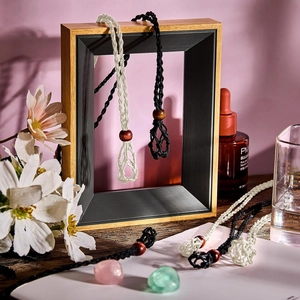 Handmade woven crystal holder necklace with adjustable black and white cord nets