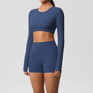 Close-up of seamless yoga set with padded long sleeve crop top and high waist shorts