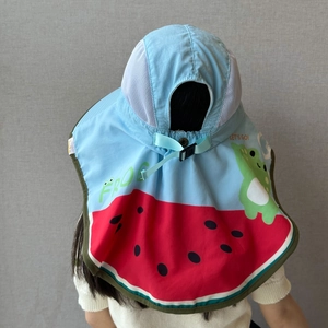 Rear view of blue kids sun hat with neck flap, mesh vents and cartoon frog print