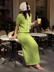 Chic knit two-piece set featuring hollow polo top and maxi skirt in avocado green