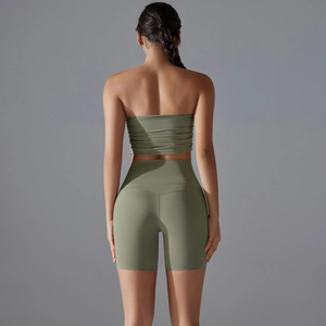 Rear view of seamless yoga set with high waist compression shorts in sage green fabric