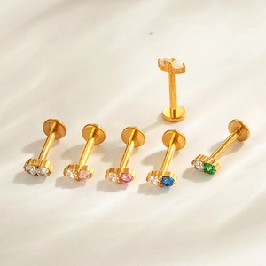 F136 titanium gold flat back studs featuring colorful double cubic zirconia gemstones