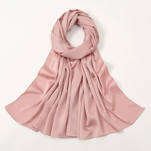 Pink silk-touch satin hijab scarf with smooth texture shown on white background