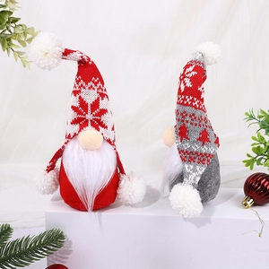 Festive Christmas faceless gnome plush dolls with snowflake knit hats on display stand